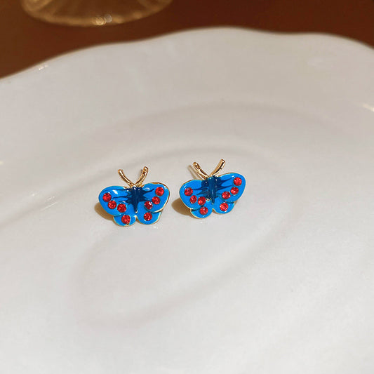 Gempoetry | Blue enamel drop glazed butterfly earrings mini earrings cute, compact, exquisite, niche design temperament silver needle earrings